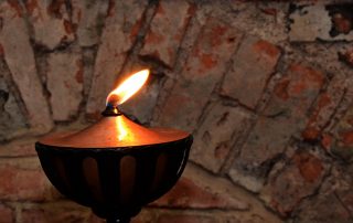 Close up of an oil lamp.