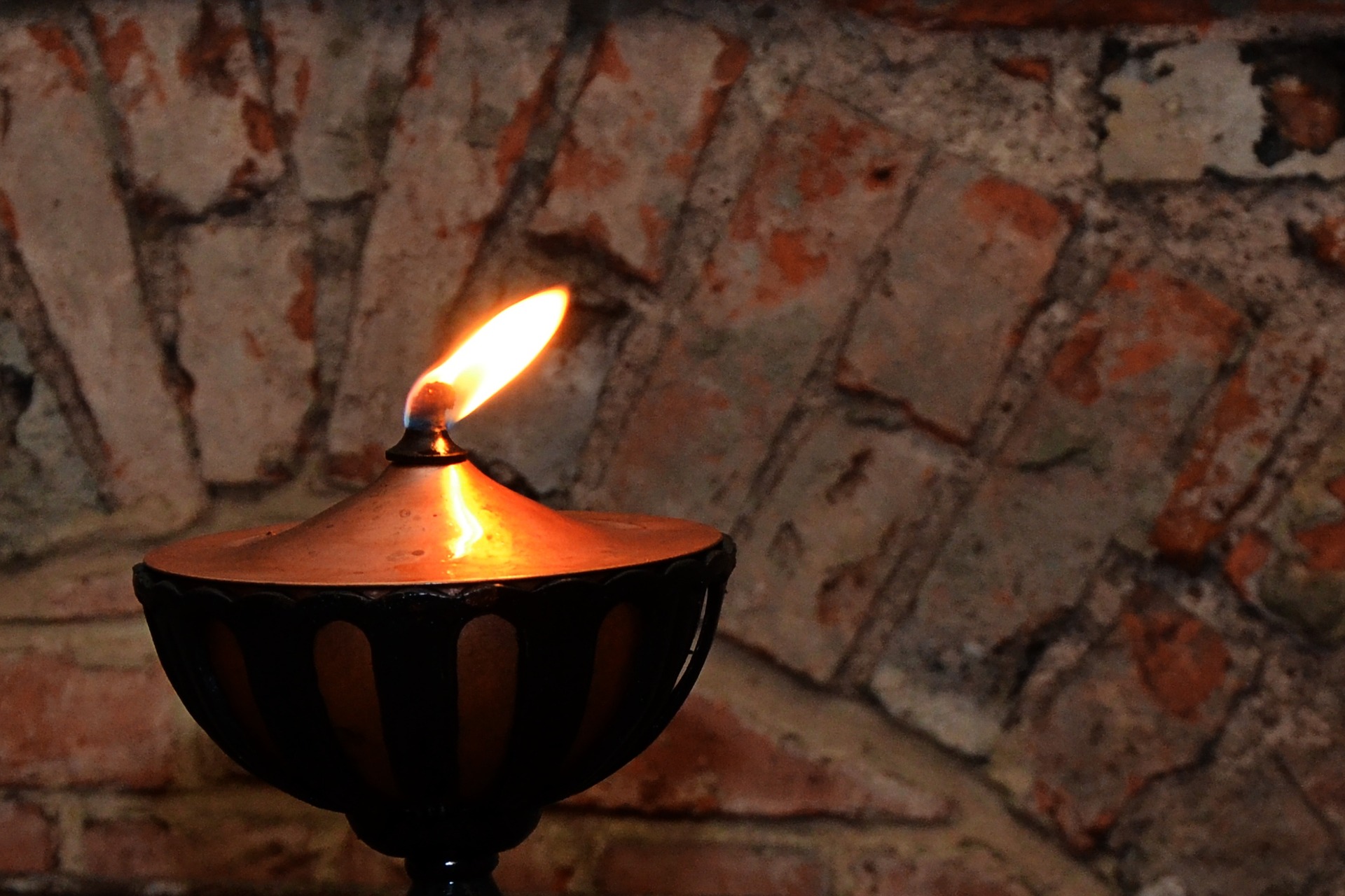 Close up of an oil lamp.
